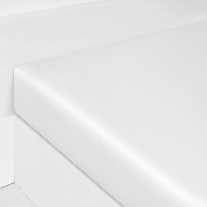 Solid Fitted Sheet in White corner shot of the bed