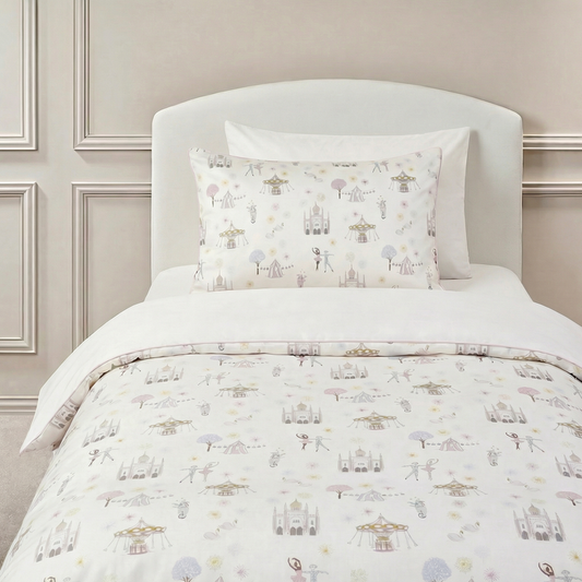 Adventure In wonderland Print in Pink on a Twin Bed with a Pillowcase