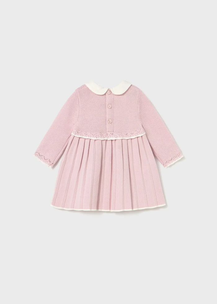 Back view of Mayoral baby girl knit dress with button fastening