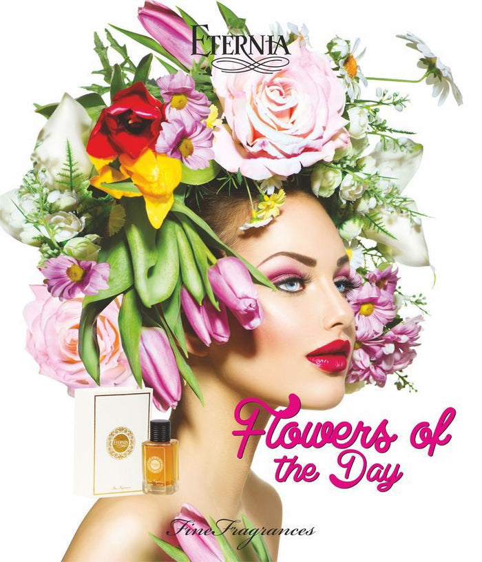 Eternia eau de parfum bottle with flower-themed label, shown with rose and blooms
