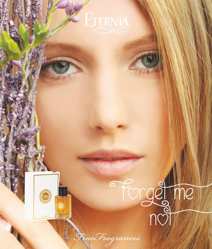Forget Me Not eau de parfum bottle and box with floral accents