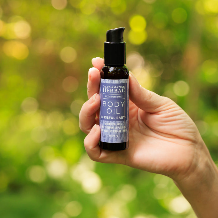 Blissful Earth Body Oil 2oz Lifestyle Outdoor Human Hand