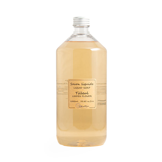 A clear plastic bottle filled with yellow liquid soap, labeled 'Authentique Linden Flower Liquid Soap'.