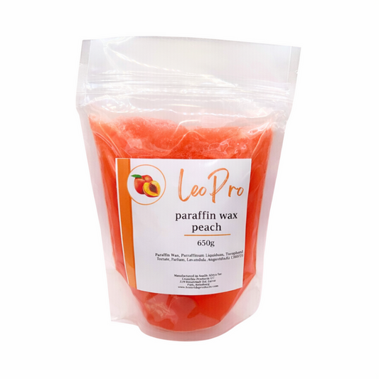W012K Peach Paraffin Wax 650g | Packaged Peach paraffin wax with 'Leo Pro' branding on a white background