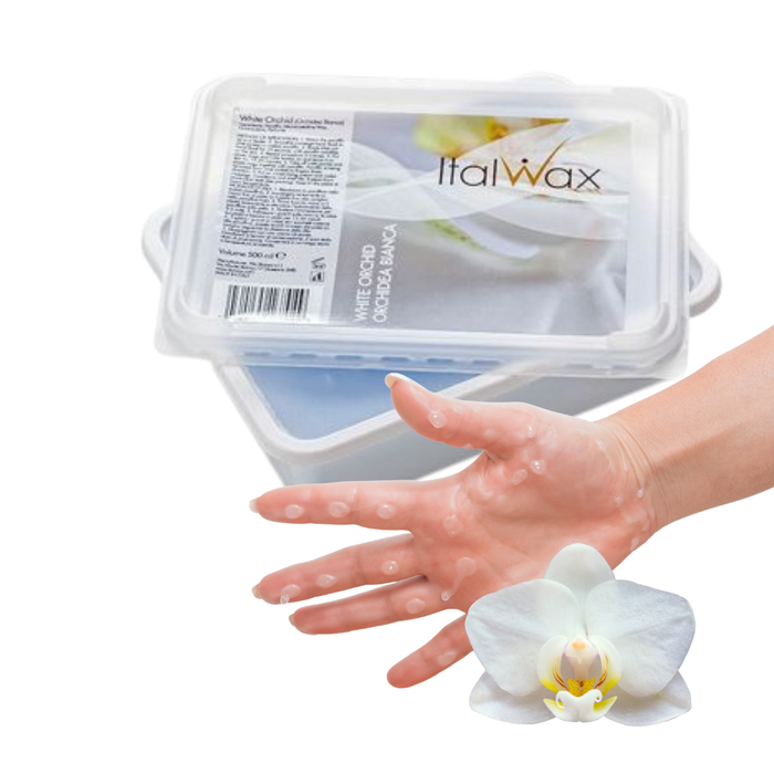 W321 Italwax Orchid Paraffin Wax | A hand in front of a clear plastic wax melt container labeled Italwax White Orchid Aromatic paraffin wax, with wax melts visible inside and a white orchid flower shown in front on a white background.