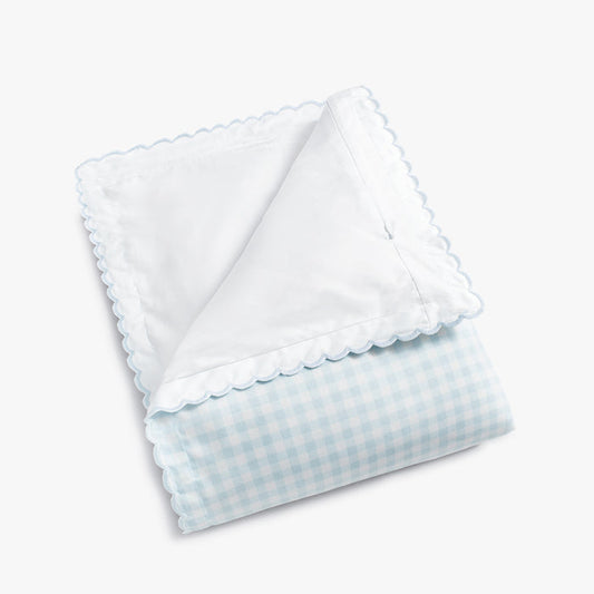 folded blue gingham baby duvet