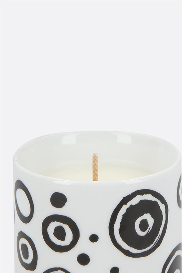 scented candle with cover