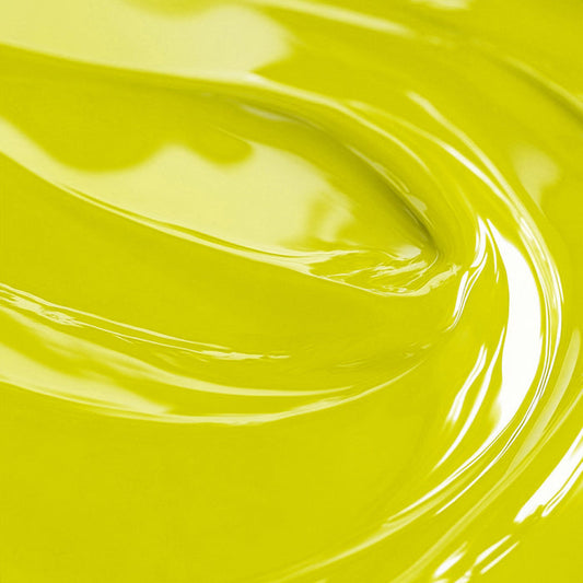 Close-up of a yellow fluorescent liquid candle dye.