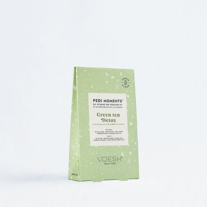 Green tea detox package by Voesh on a white background
