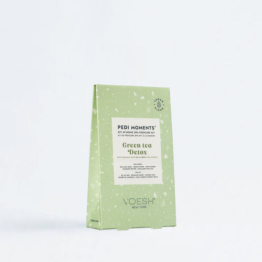 Green tea detox package by Voesh on a white background